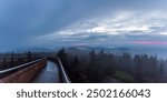 Majestic misty view from Climgmans Dome Observation Tower in the Great Smoky Mountains National Park during blue hour.