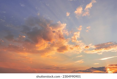 majestic morning colorful sunlight brush in air. heavenly light reflected on fluffy clouds in golden time. bright sun beams rays over panoramic view in summer gorgeous season. freedom n peaceful life