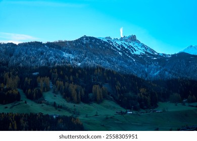 Majestic mountain range at twilight with snow-capped peaks and lush valleys in the Dolomites - Powered by Shutterstock