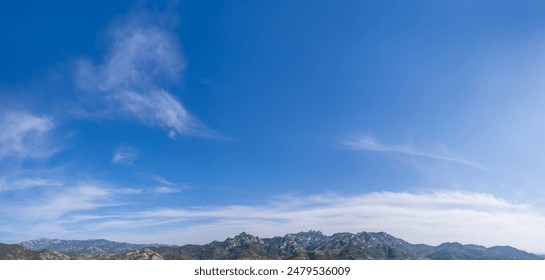 Majestic Mountain Range Under Clear Sky - Powered by Shutterstock