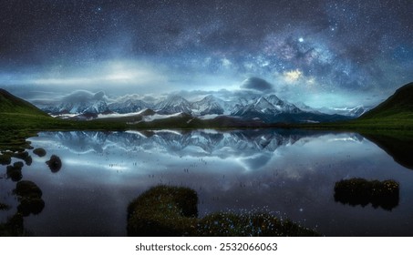 Majestic mountains reflect in a tranquil lake beneath a starry night sky, with wispy clouds and a luminous galaxy illuminating the scene. - Powered by Shutterstock