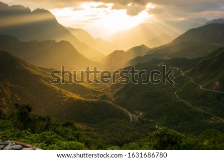 the majestic moutain ranges and long pass in vietnam with magical of the light and sky at sunset