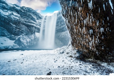 Majestic nature of winter Iceland. Impressively View on Skogafoss Waterfal. Skogafoss the most famous place of Iceland - Shutterstock ID 2231530699