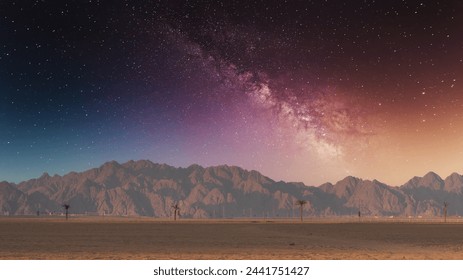 Majestic night sky with the Milky Way over orange desert sand, mountains and isolated palm trees. Copy space background or wallpaper. - Powered by Shutterstock