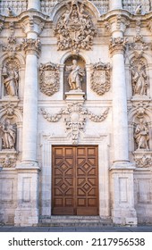 Majestic And Ornate Eighteenth Century Baroque Style Door Of The University Of Valladolid, Spain