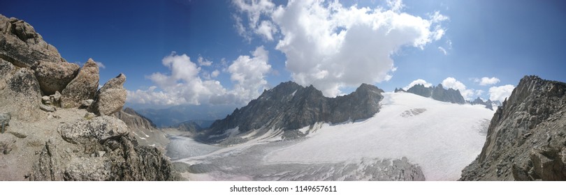 Majestic panoramic scenery of Plateau du Trient Glacier on a beautiful cloudy Summer afternoon in the high altitude of Swiss Alps in the Summer