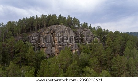 Majestic rocky outcrop in Mongolian forest