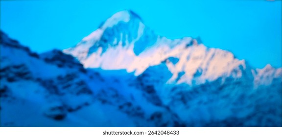 Majestic snow-covered mountain peak glowing in sunlight under a clear blue sky, symbolizing nature's purity, peace, and elevation.
						#Hashtags: #SnowMountain #WinterWonders #Himalayas #MountainView #Sno