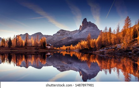 Majestic sunset of the mountains landscape. Wonderful Nature landscape during sunset. Beautiful colored trees over the Federa lake, glowing in sunlight. wonderful picturesque scene. color in nature - Shutterstock ID 1487897981
