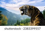 A majestic tiger stands on top of a mountain, surveying its domain. This image is perfect for nature lovers, wildlife enthusiasts, and anyone who appreciates the beauty of the natural world.