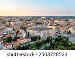 Majestic view at famous european city of Pula and arena of roman time. Location place of Istria county, Croatia, Europe. Wonders of the world. UNESCO world heritage site.