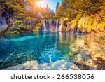 Majestic view on turquoise water and sunny beams in the Plitvice Lakes National Park. Croatia. Europe. Dramatic unusual scene. Beauty world. Retro filter and vintage style. Instagram toning effect.