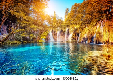 Majestic View On Turquoise Water And Sunny Beams.  Location Famous Resort Plitvice Lakes National Park, Croatia, Europe. Dramatic And Vivid Scene. Beauty World. Retro Filter. Instagram Toning Effect. 