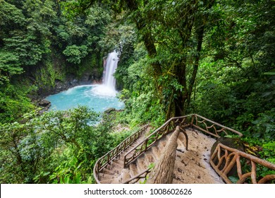 Majestic waterfall in the rainforest jungle of Costa Rica. Tropical hike. - Shutterstock ID 1008602626