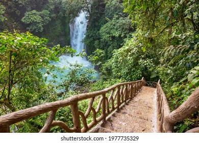 Majestic waterfall in the rainforest jungle of Costa Rica. Tropical hike. - Shutterstock ID 1977735329