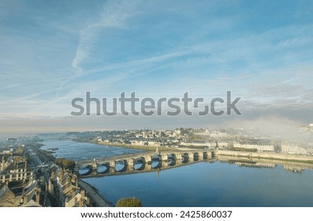Majestic Waterscape: A Bridge Anchored in the Serene Expanse of Blois, Val De Loire