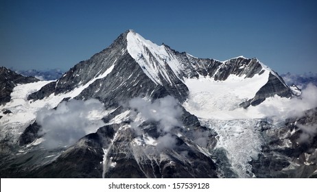 Majestic Weisshorn, a beautiful snow caped mountain peak in Switzerland - Powered by Shutterstock