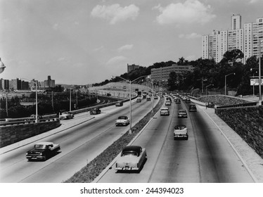 Major Deegan expressway seven miles outside New York City has six lanes to accommodate increasing suburban commuter traffic in 1957.