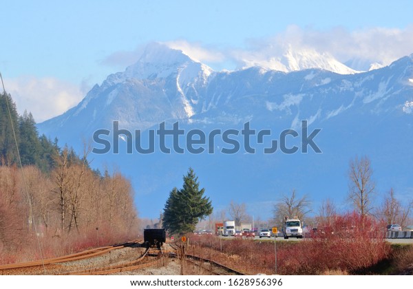 A major transportation hub where railway lines straddle\
the Trans Canada Highway in southwestern British Columbia, Canada.\
