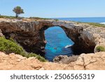 Majorca arch cliff in a sunny summer day