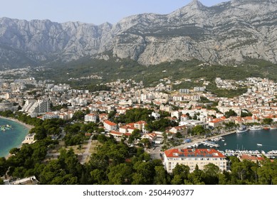 Makarska, Croatia. Coastal town, sea and mountains. Aerial photography from a drone. Croatian town on the Adriatic Sea. Makarska Riviera - Powered by Shutterstock