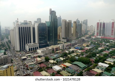 Makati District , Manila, Philippines - 10 March 2016 :Manila's High-rise Office Buildings Provide A Stark Contrast To The Neighbouring Poor Areas Adjacent To Them.