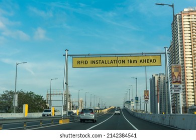 Makati, Metro Manila, Philippines - April 2022: Driving through the northbound lane of Skyway. Approaching an RFID Installation Site.
