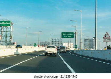 Makati, Metro Manila, Philippines - April 2022: Driving through the northbound lane of Skyway. Approaching Nagtahan Exit.