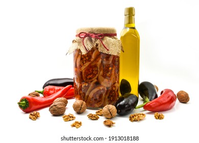 Makdous in Jar with vegetables and olive oil isolated on white background
