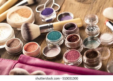 Make up artist theme. Various makeup products. Top view. Set of professional cosmetic: make-up brushes, shadows, lipstick. Place for typography and logo.
