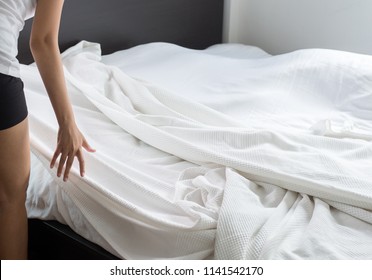 Make A Bed,Woman Making Her Bed In Room After Wake Up