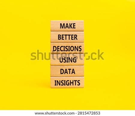Make better decisions using data insights symbol. Concept words make better decisions using data insights on wooden blocks. Beautiful yellow background. Business concept. Copy space.