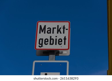 Make a bold statement with this striking shield labeled "markt-gebiet." Its sleek design and strong presence exude confidence and inspire market leadership.