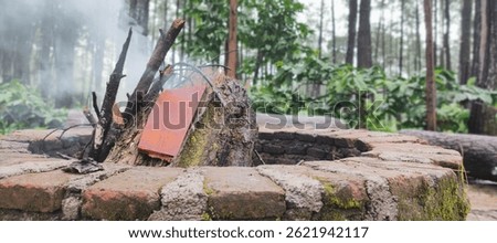 make a fireplace in the middle of a pine forest