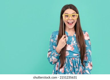 Make it fun. Funny girl hold prop glasses. Happy kid smile having fun. Disguise party. Create joy - Shutterstock ID 2151235631