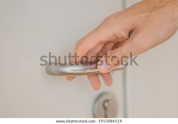 Make hand grab\
doorknob latch to open steel door to enter building, security lock\
for entrance and doorway
