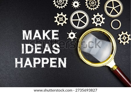 Make Ideas Happen text message with magnifying glass on black background