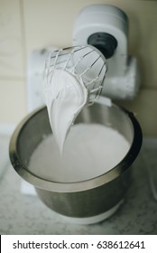 make mousee for cake on electric mixer into bowl