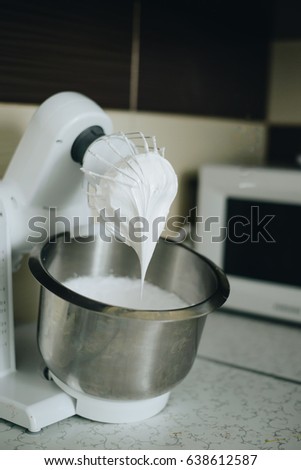 make mousee for cake on electric mixer into bowl