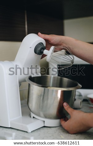 make mousee for cake on electric mixer into bowl