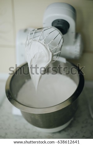 make mousee for cake on electric mixer into bowl