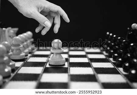 Make a move is shown by Chessman playing chess and makes the first move a pawn. What is your next step