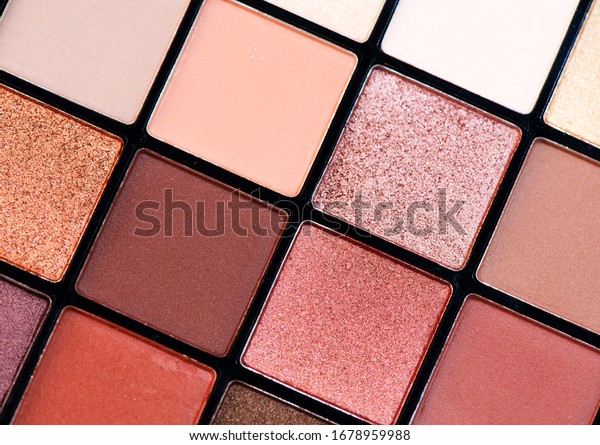 Make up palette set. Professional multicolor\
eyeshadow palette. Makeup. Professional multicolor eye shadow\
make-up palette background, close-up. Various Colorful bright eye\
shadows backdrop