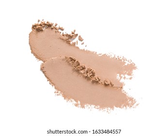 Make up powder texture. Beige eye shadow, foundation swatch smear smudge isolated on white. Light brown cosmetic powder sample closeup