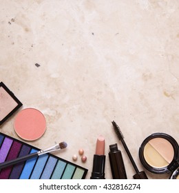 Make Up Products Laid Flat On A Marble Counter Top Background To Form A Page Border