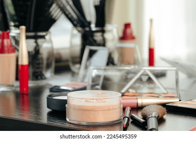 Make up products on vanity table close up