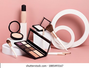 Make up products prsented on white podiums on pink pastel background. Mockup for branding and packaging presentation - Shutterstock ID 1885493167