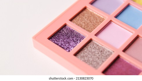 Make up shimmer pigment bright colorful eyeshadow palette. Decorative cosmetics and visage concept. - Shutterstock ID 2130823070