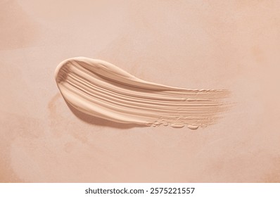Make up smear foundation drops smudge texture beige background