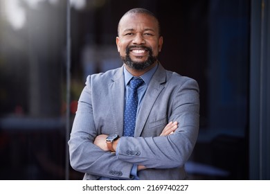 I Make Things Happen For Myself And Those Around Me. Shot Of A Businessman Wearing A Suit While Standing Outside.